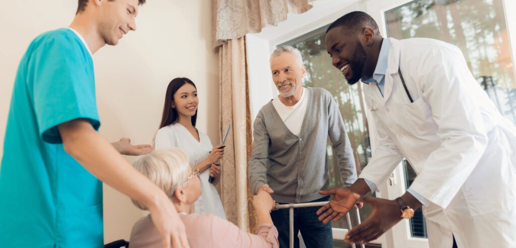 doctors and nurse talking to patients