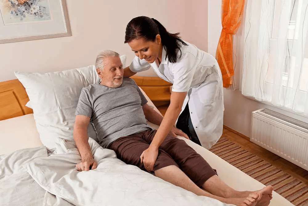 doctor adjusting patient's leg