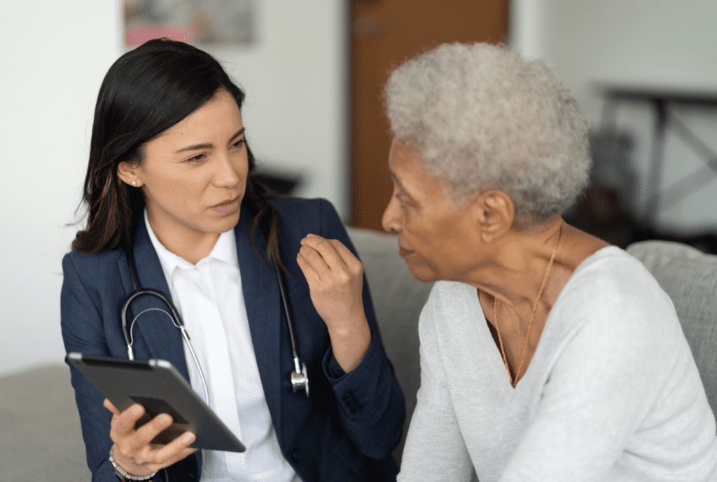 doctor speaking with patient