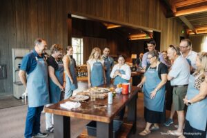 team standing around table