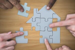 a perfect fit of puzzle pieces of a house